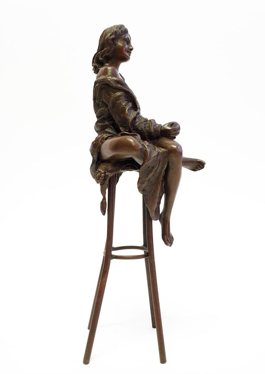 A Lady On Stool