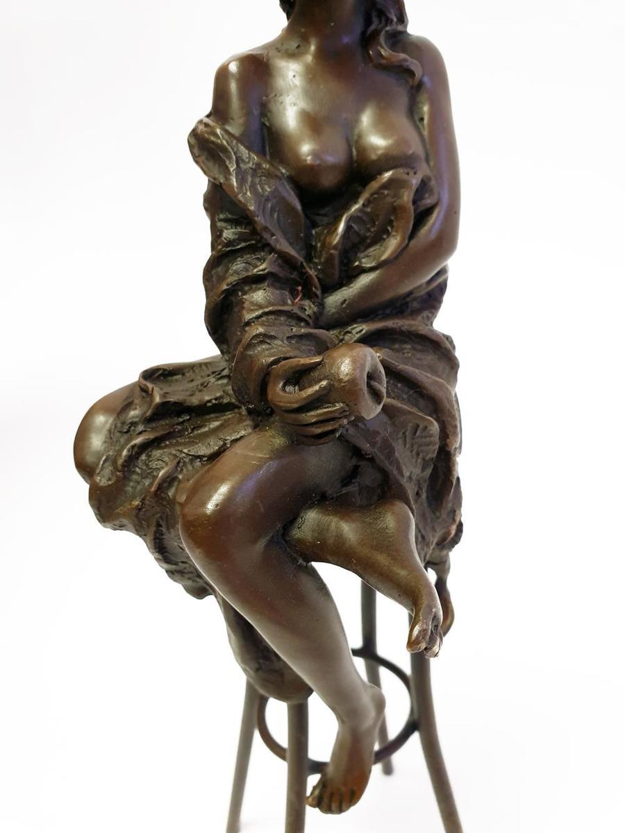 A Lady On Stool